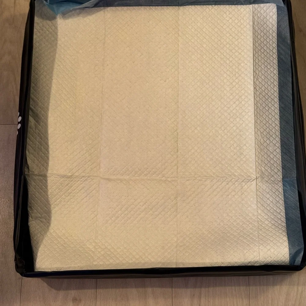 Dog potty pad holders trays bundle. One is black and one is gray.